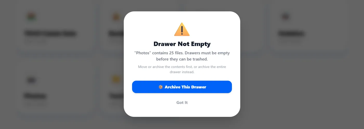 The Drawer Not Empty modal in Enoch File, showing a warning triangle, a message that the drawer “Photos” contains 25 files and must be empty before it can be trashed, and two options: Archive This Drawer and Got It.